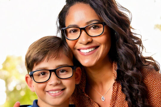 a mother and child wearing glasses